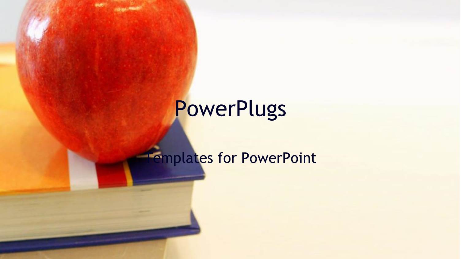 big Red Apple on a Text Book on a White Background