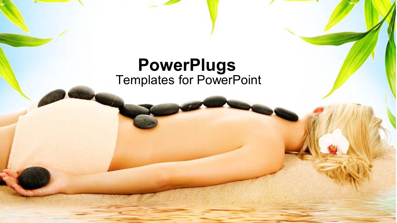 Blond Woman Receiving Hot Stone Spa Treatment on Beach with Green Leaves