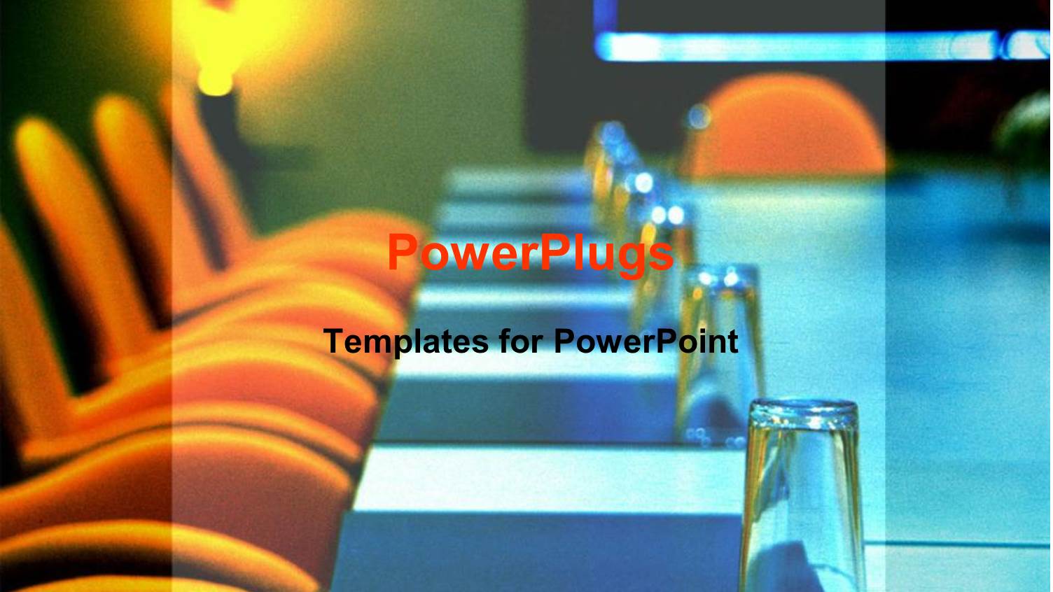 Board Room Set Up for a Meeting with Orange Chairs, Folders and Glasses