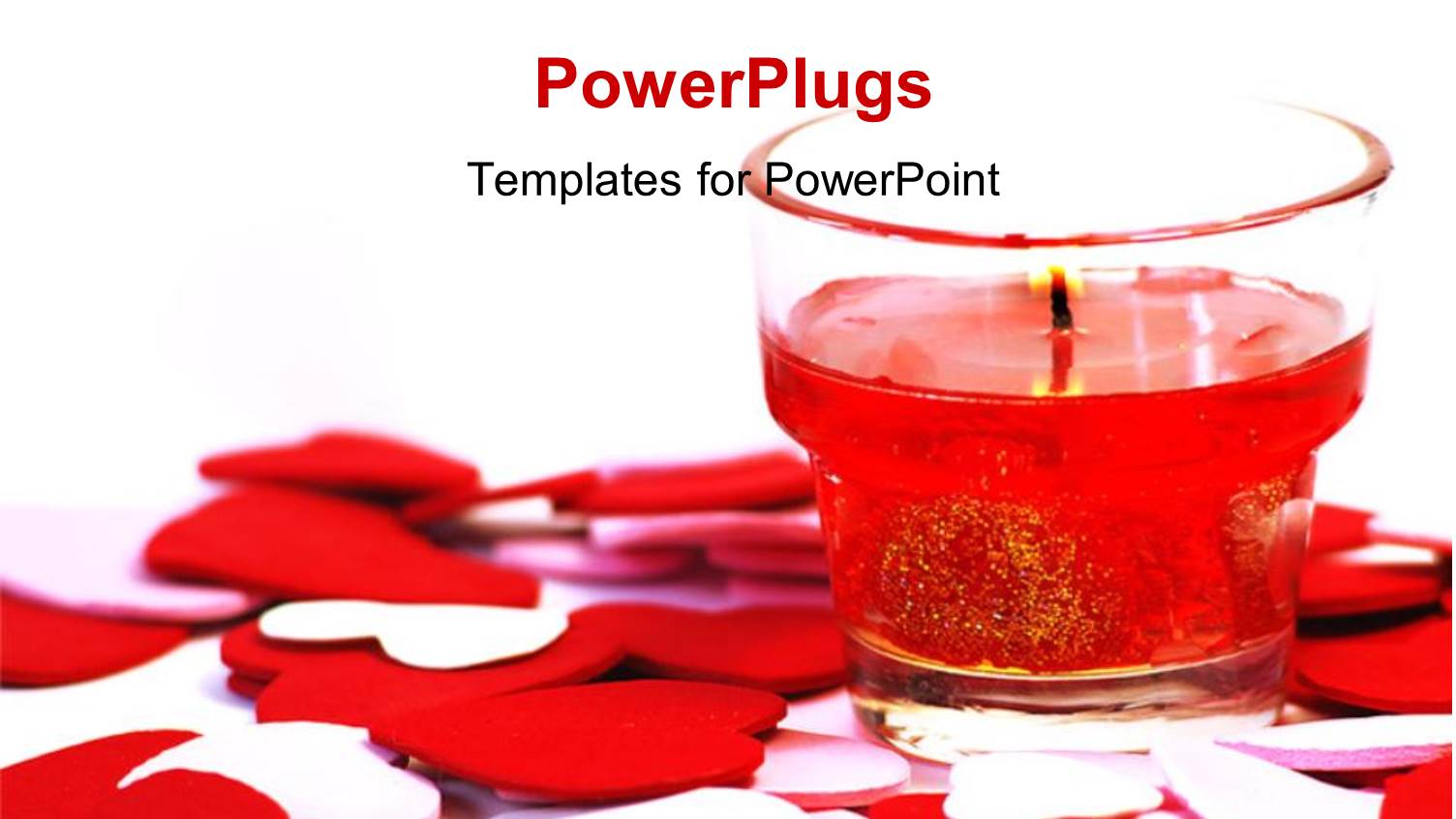 Burning Candle in Transparent Candle Holder with Red and White Heart Shapes