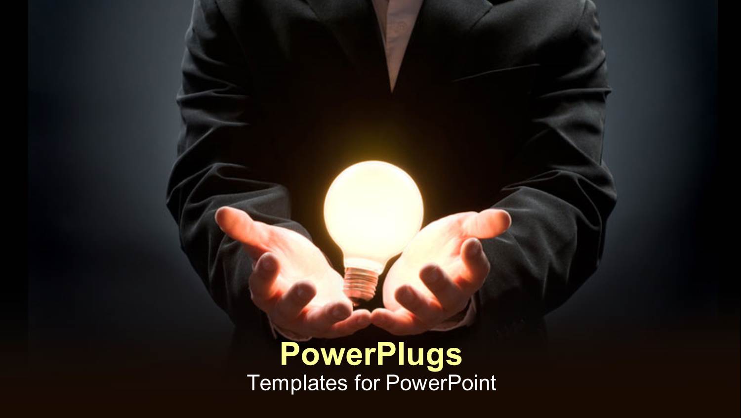 Business Man in Suit Holding Light Bulb