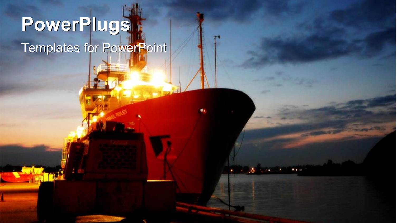a Cargo Ship Sailing on a Harbor at Night