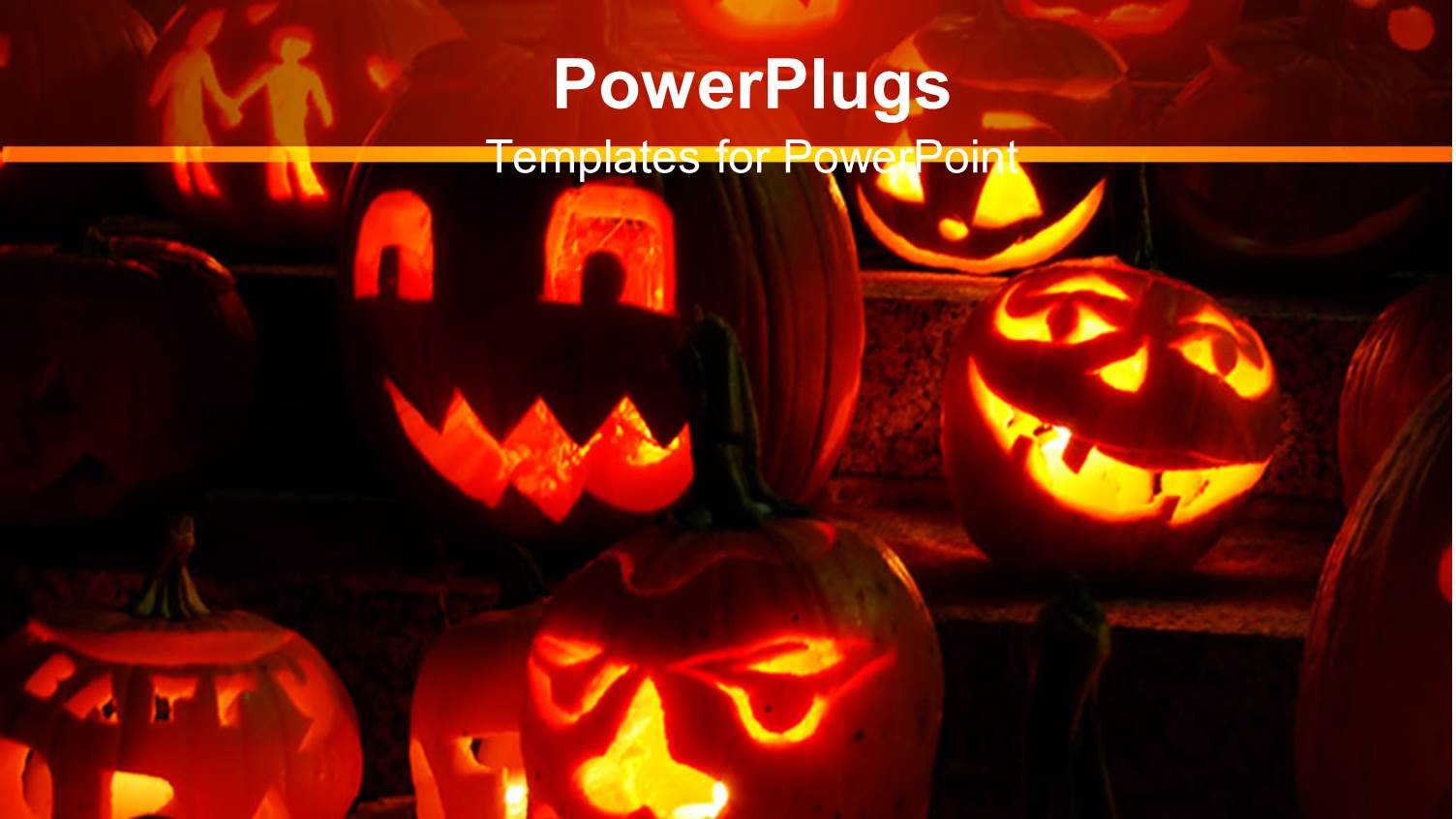 Carved Glowing Pumpkins at Night Lit Inside with Candles