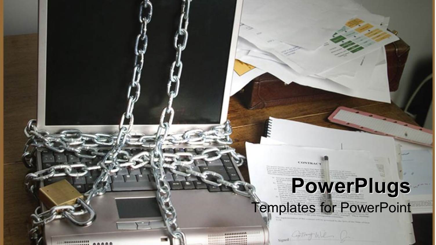 Chained Laptop with Papers and Pen