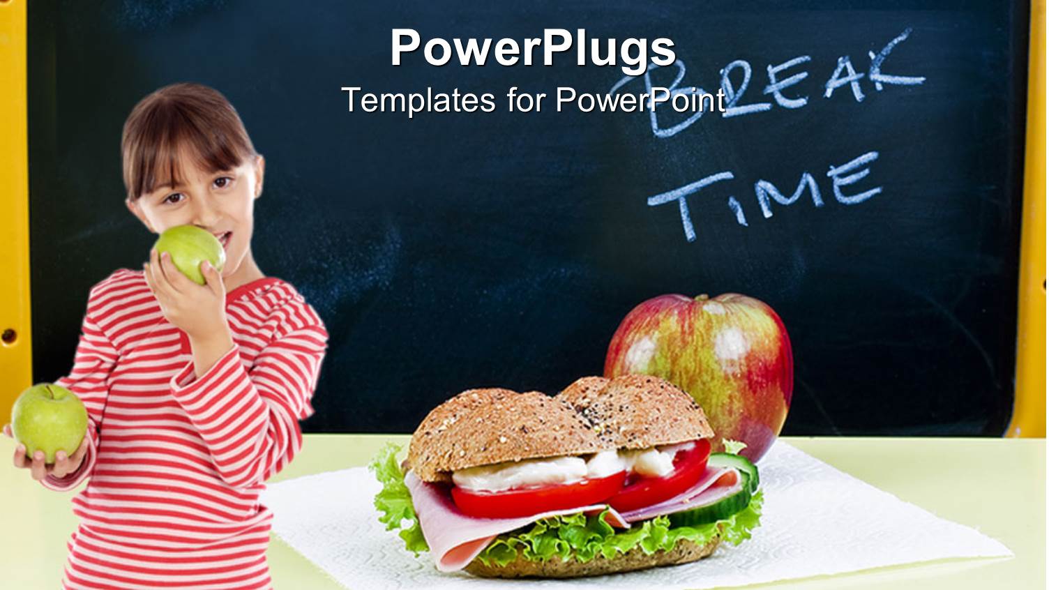 Child Eating Green Apples with Sandwich on Desk and Chalkboard