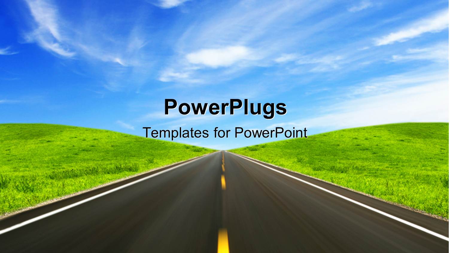 Clean Road Between Green Grass Land with Blue Cloudy Sky