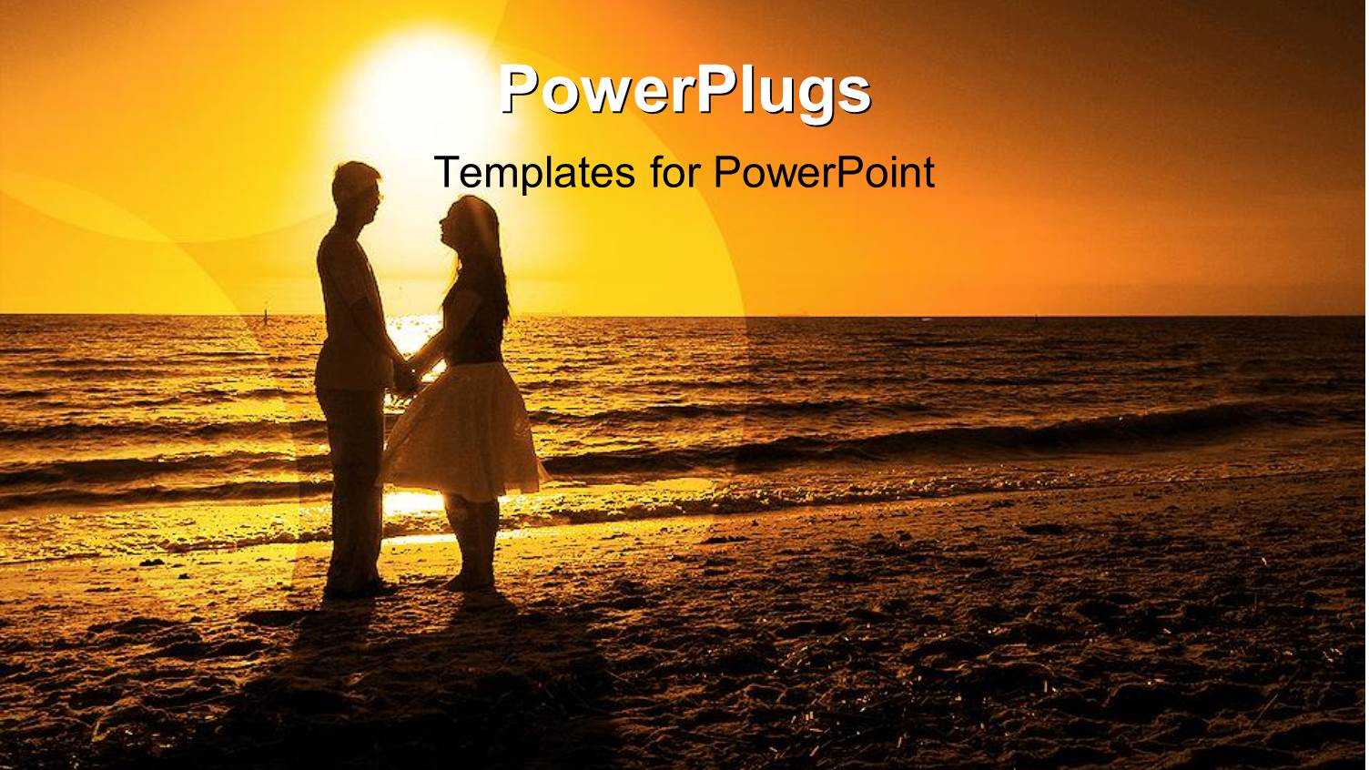 Couple Holding Hands Gazing into Each Others Eyes on Beach at Sunset