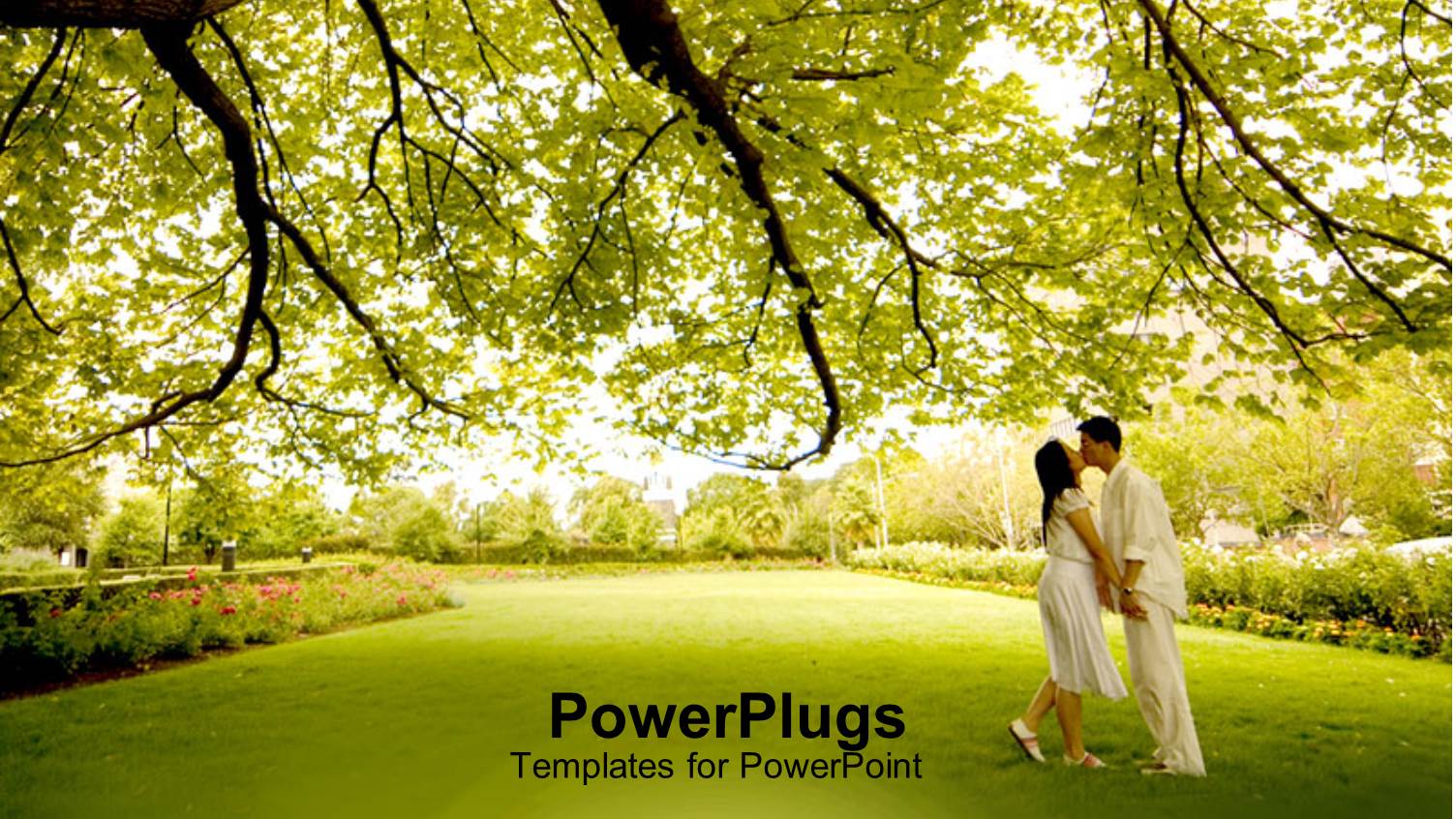 a Couple Kissing Each other with Greenery in the Background