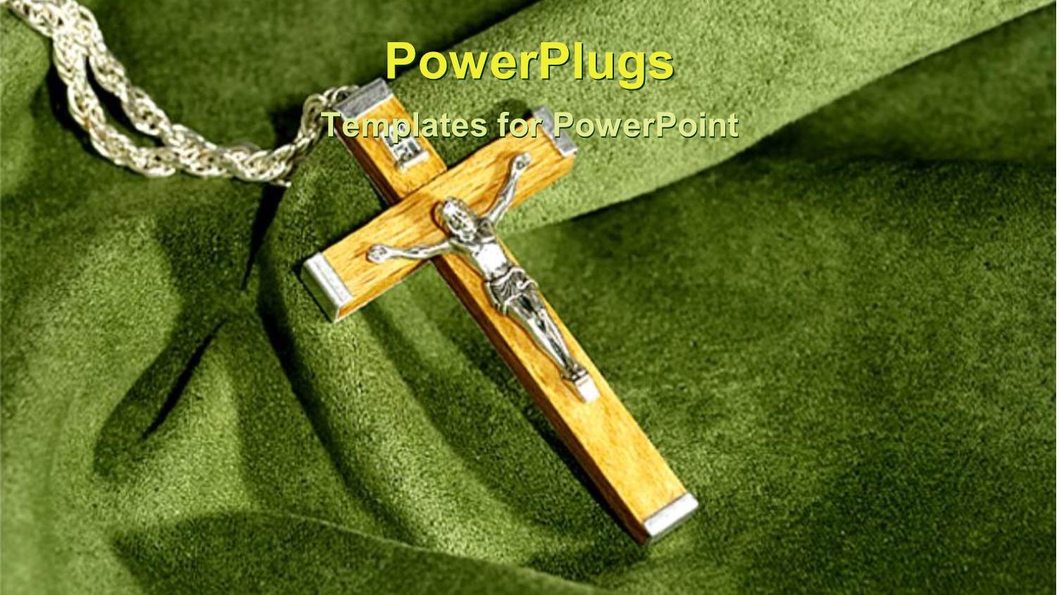 Crucifix with Wooden Cross Laying on Green Cloth