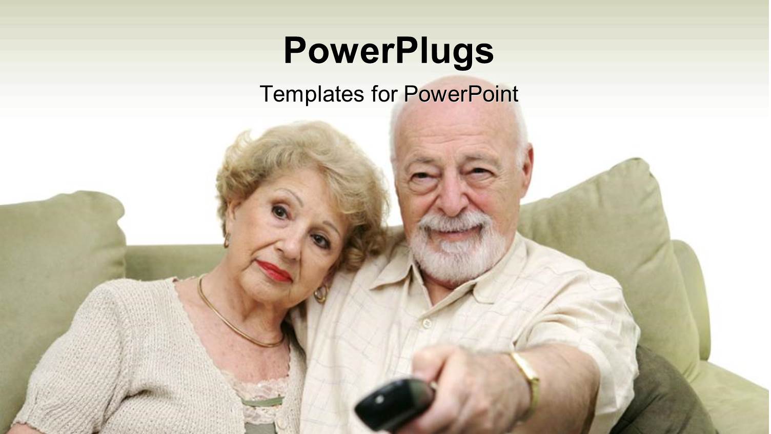 Elderly Couple on Couch with Husband Changing Channel with Remote