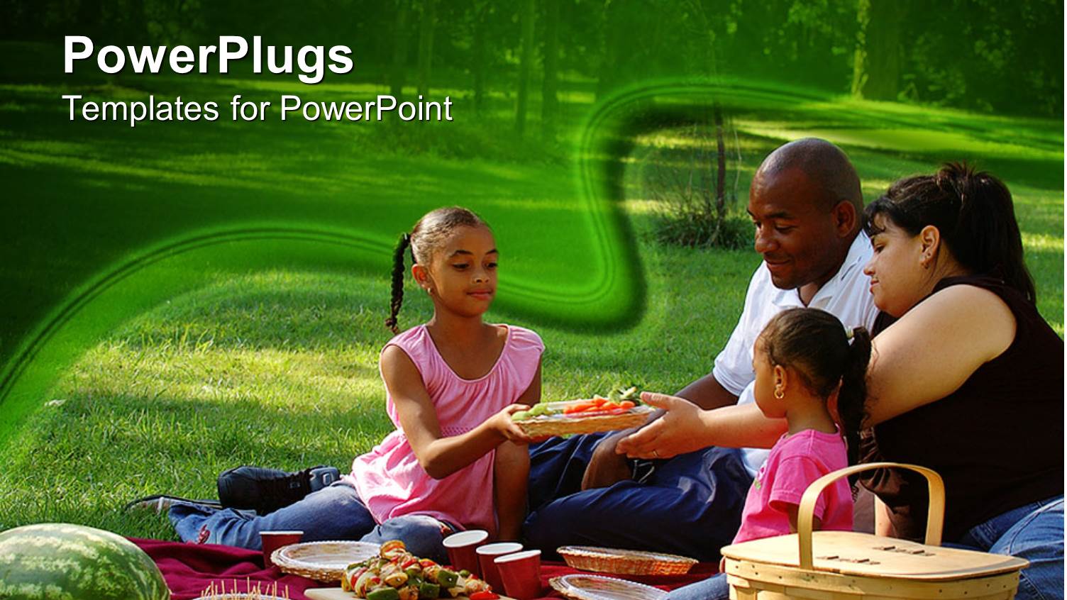 Family of Four Enjoying Picnic with Fruits and Drinks in Park