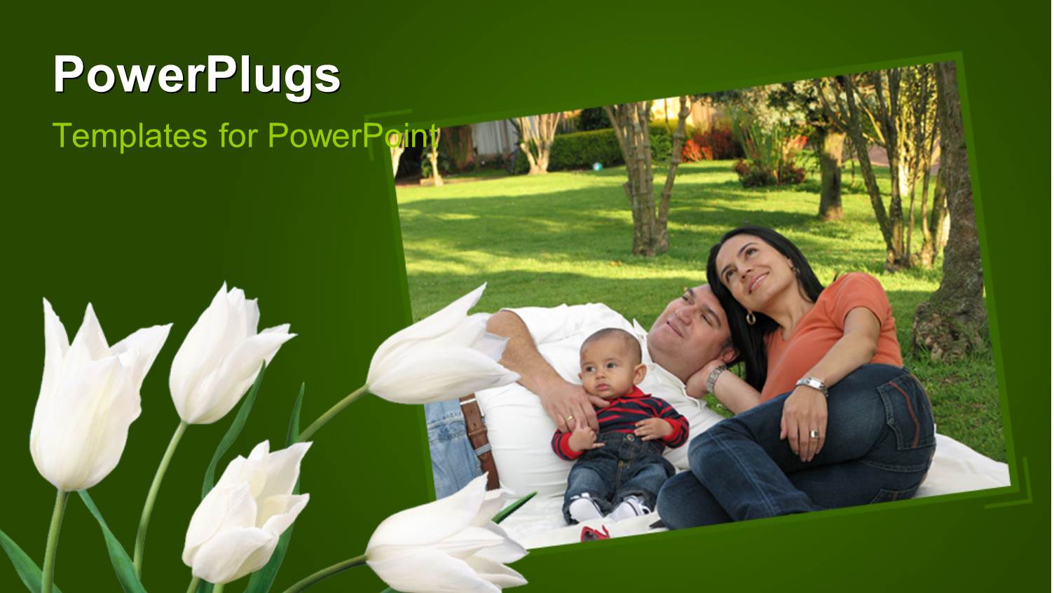 a Family of Three Having a Picnic and some White Flowers Beside them