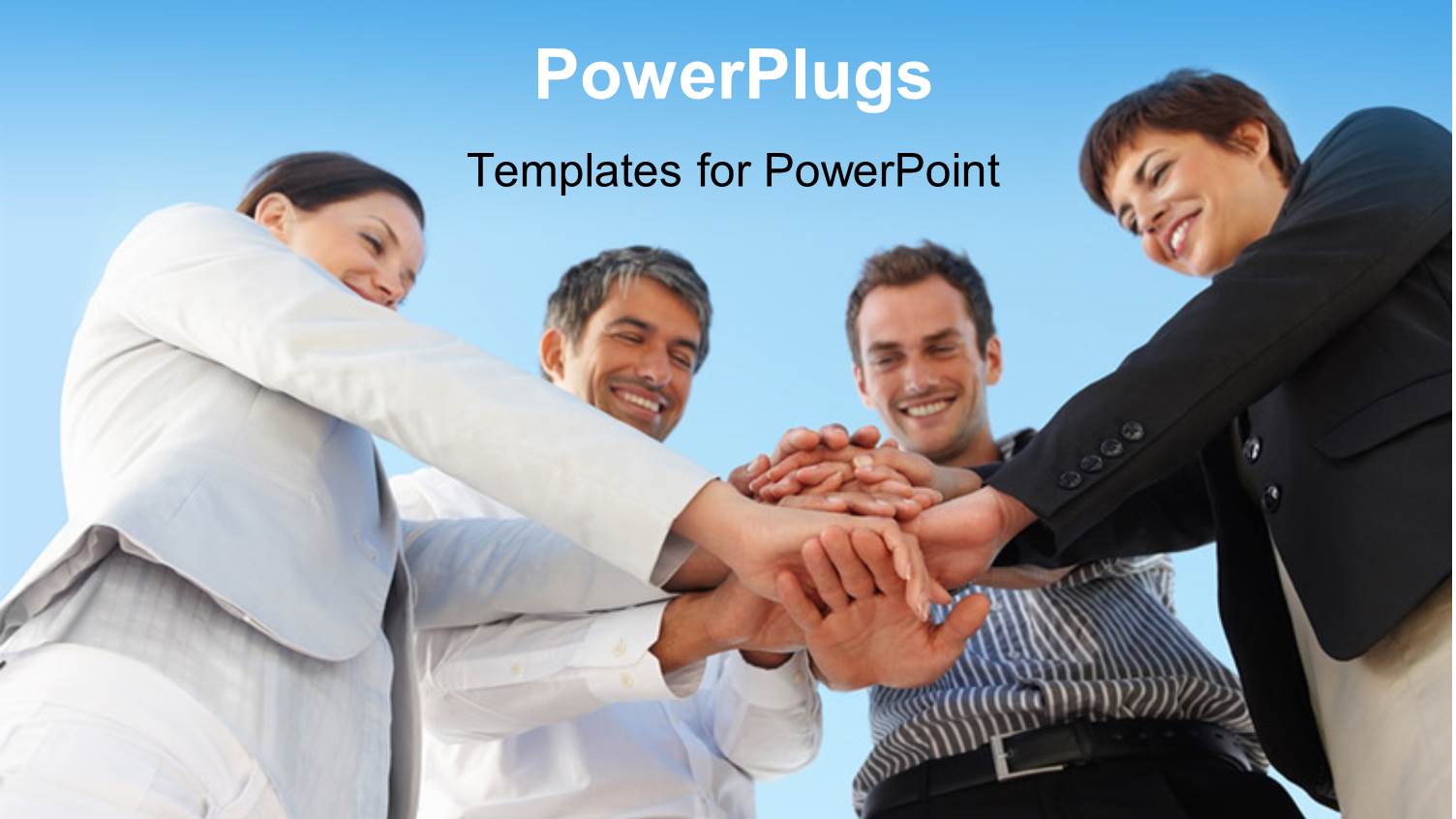 Four Happy Business People Join Hands Over Blue Background