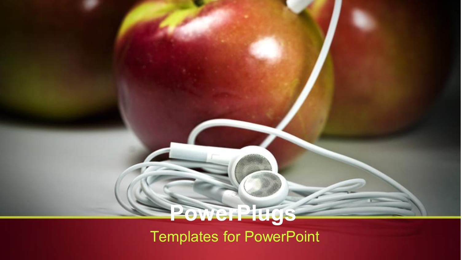 Fresh Apples with White Ear Piece Plugged in