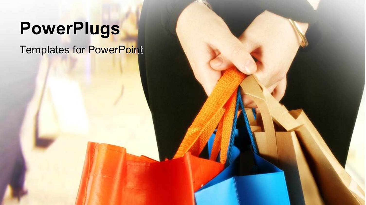a Girl Holding a Number of Shopping Bags with Blurred Background