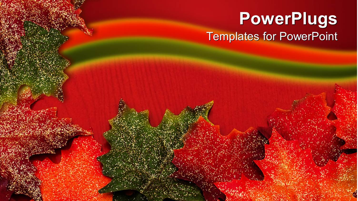 Green and Brown Colored Autumn Leaves on a Red Background