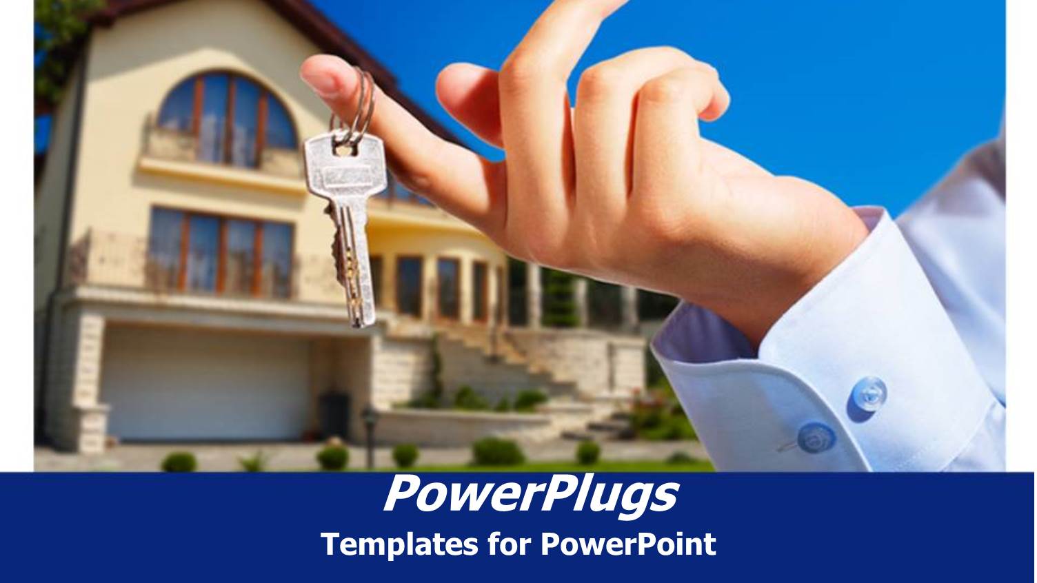 a Hand Holding the Keys with House in the Background