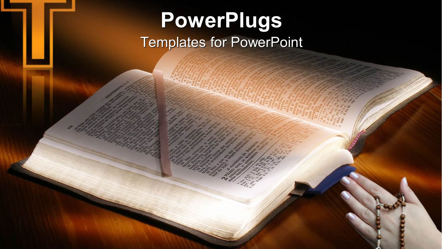 a Hand Holding a Rosary with a Bible and a Cross