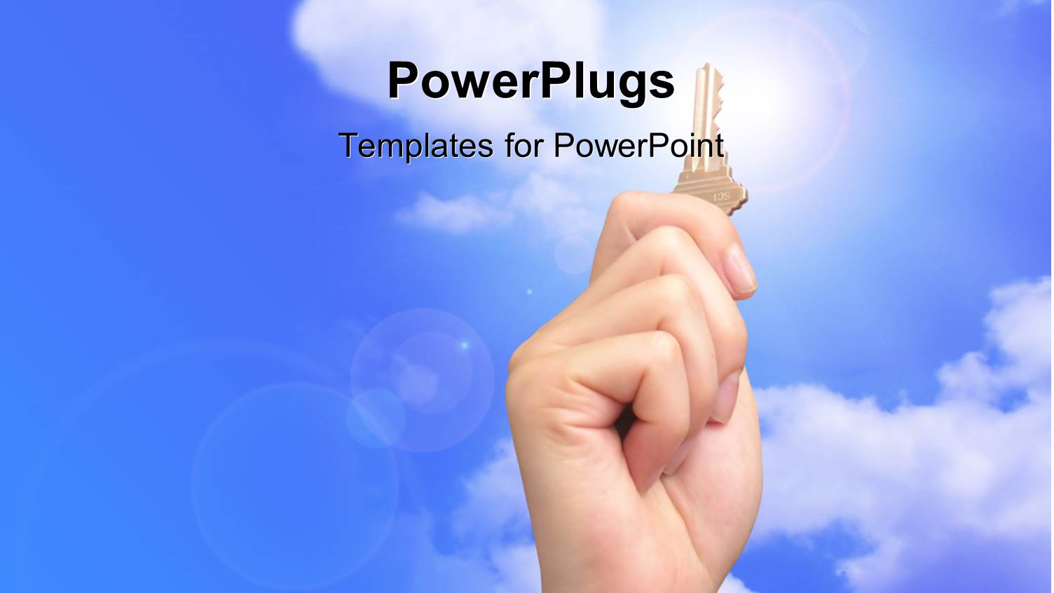 Hand Holds Up Gold Key Over Blue Cloudy Sky