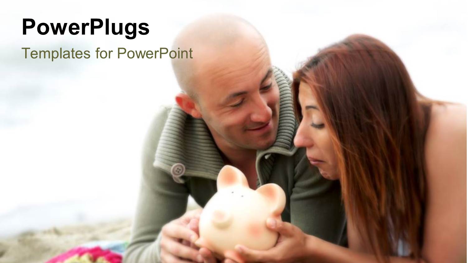 Happy Couple Lay on Mat with Piggy Bank in Hand