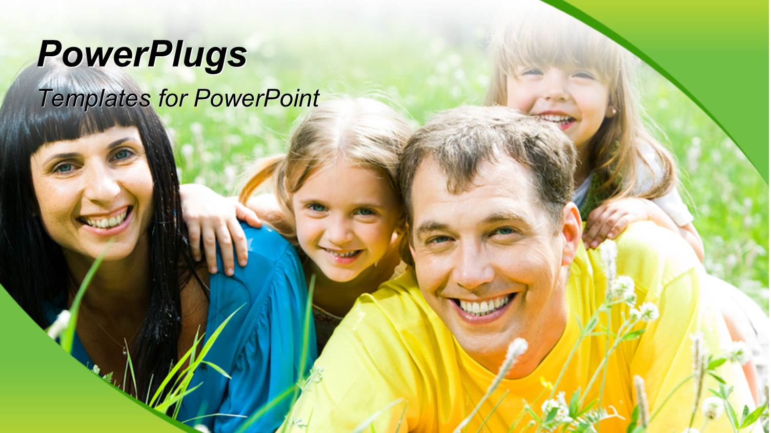 Happy Family Lying on the Grass and Having Fun with Green Color