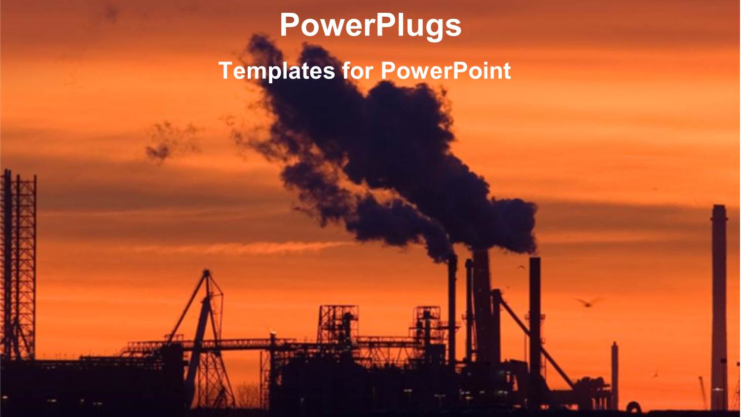 Industrial Plant at Sunset with Smoke Rising Out of Chimney