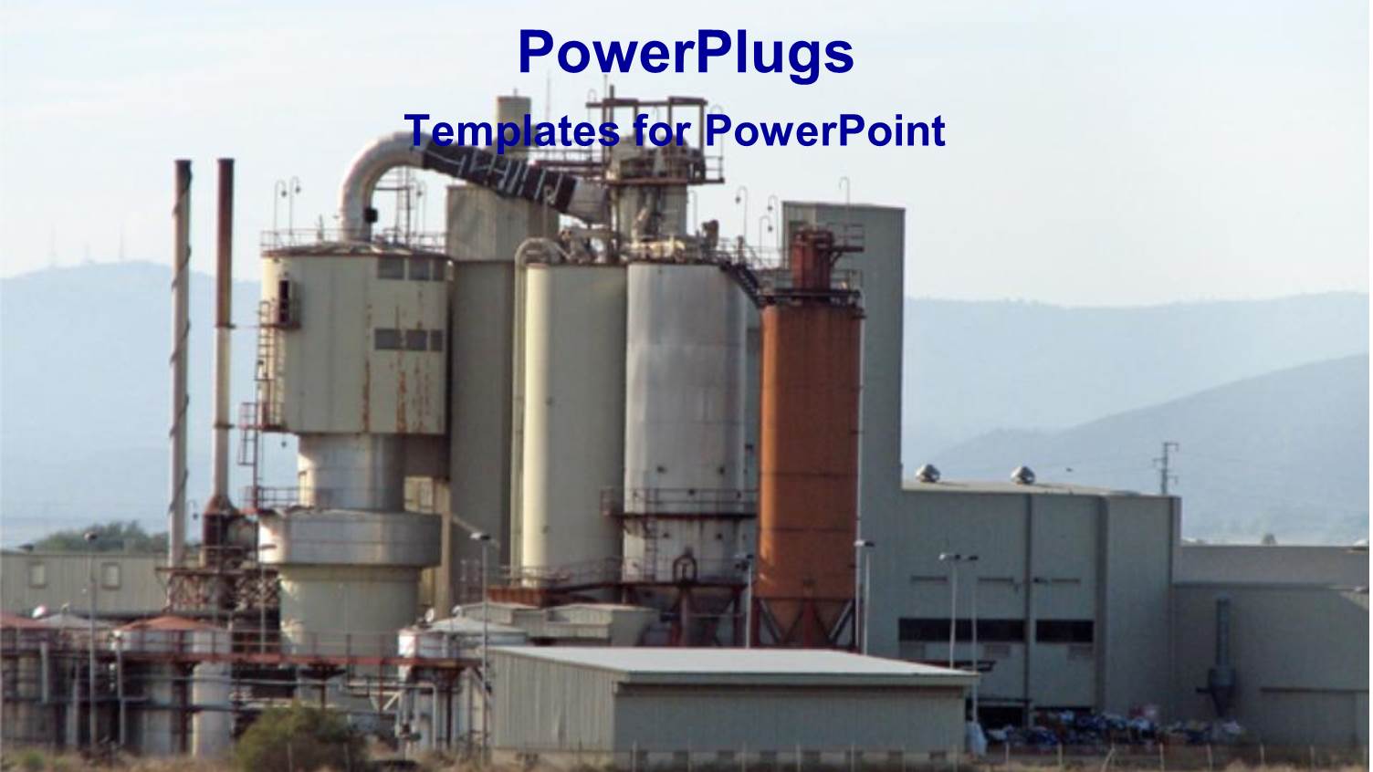 Landscape View of Industrial Plant with Green Lawn