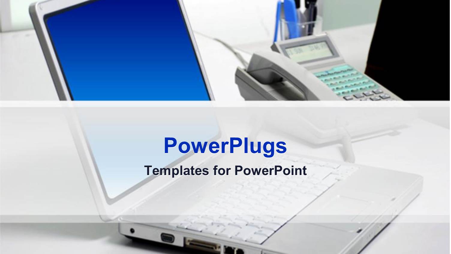 Laptop Computer Next to Phone and Office Supplies Organizer