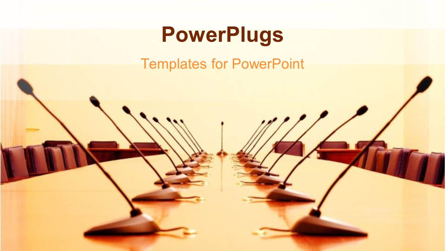 a large Conference Room with Many Chairs and Microphones