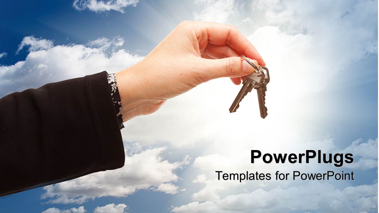 large Hand Holding Keys with a Clear Blue Sky Background and Shinning Light