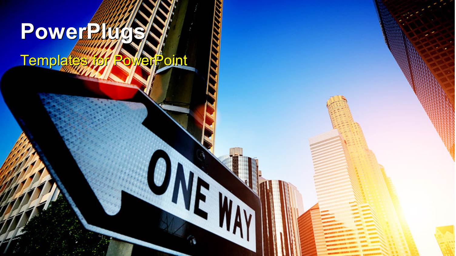 large One Way Sign in Front of City Buildings