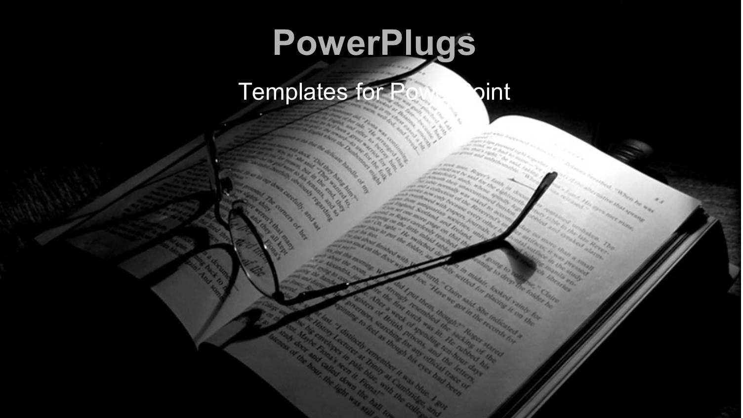 a Light Shinning on an Open Book with a Pair of Glasses