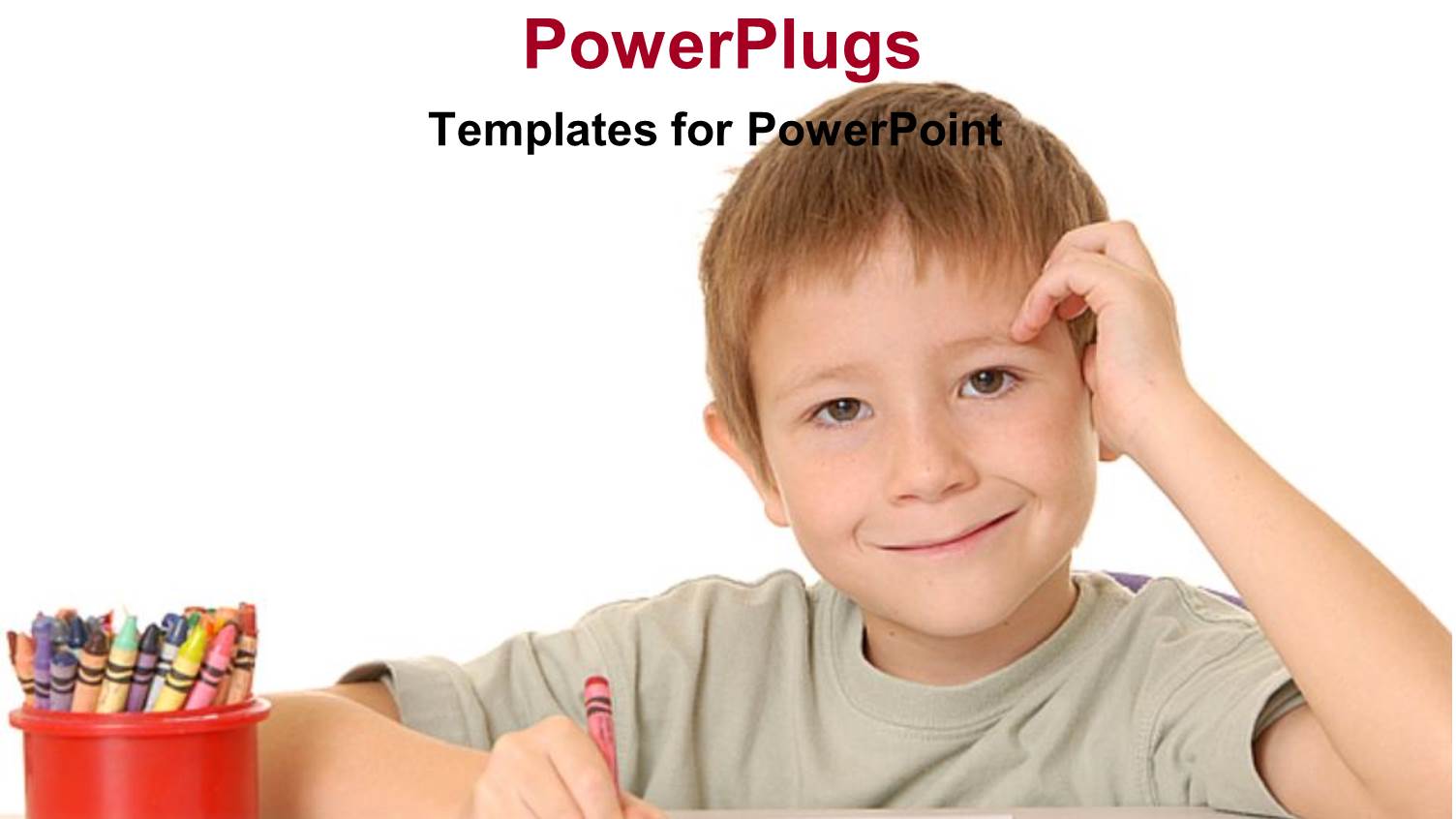 little Boy Drawing with Pencil and Red Cup Filled with Colored Pencils