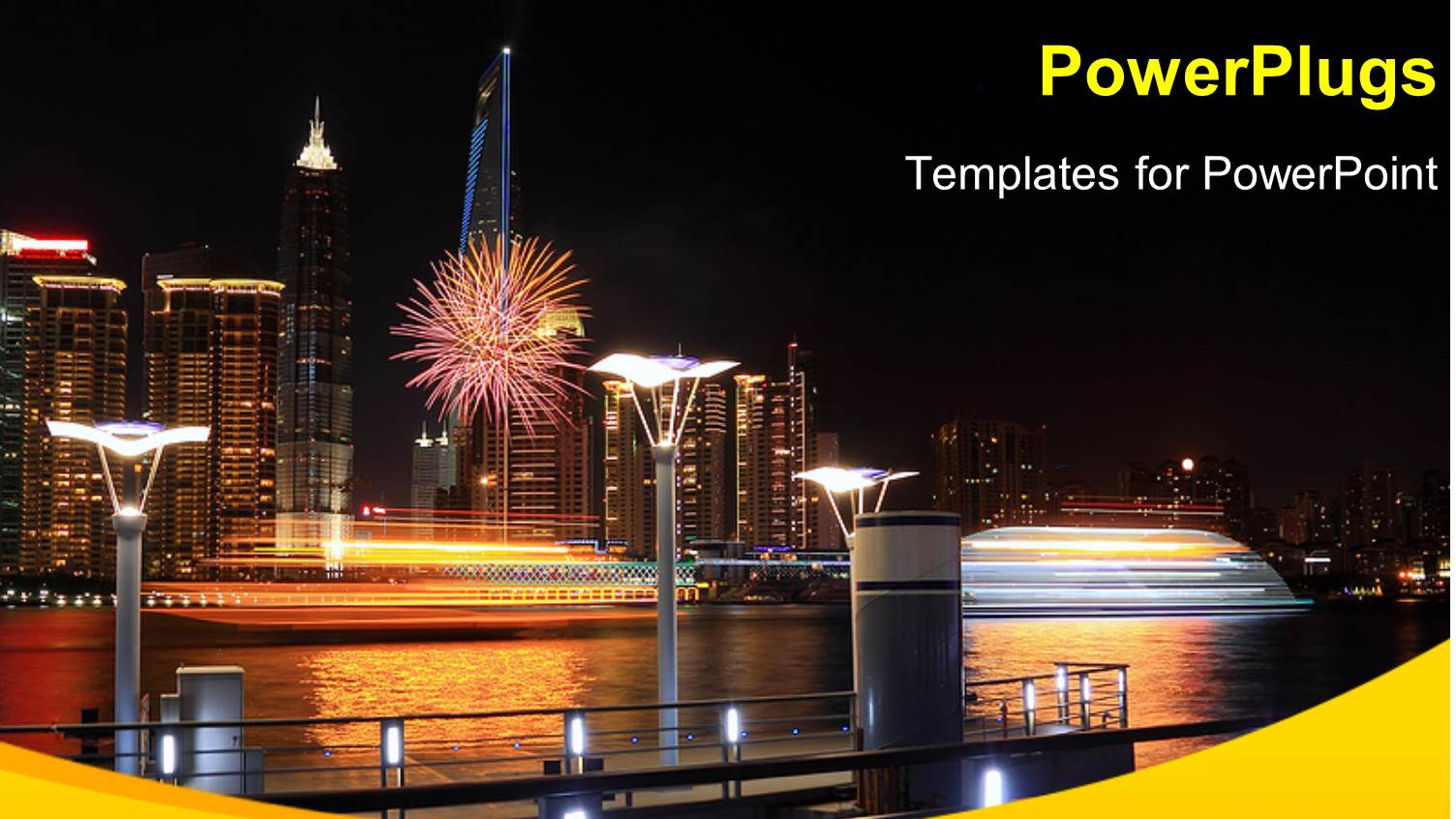 Lots of High Buildings with Lights and a Ship by the Sea Side