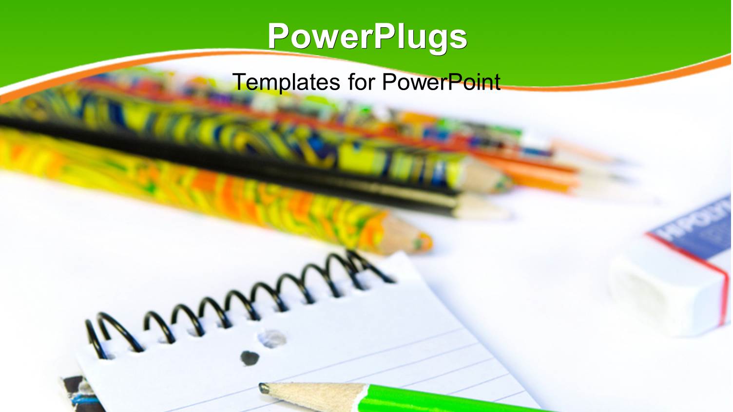 Lots of Pencils and a Jotter on a White Background