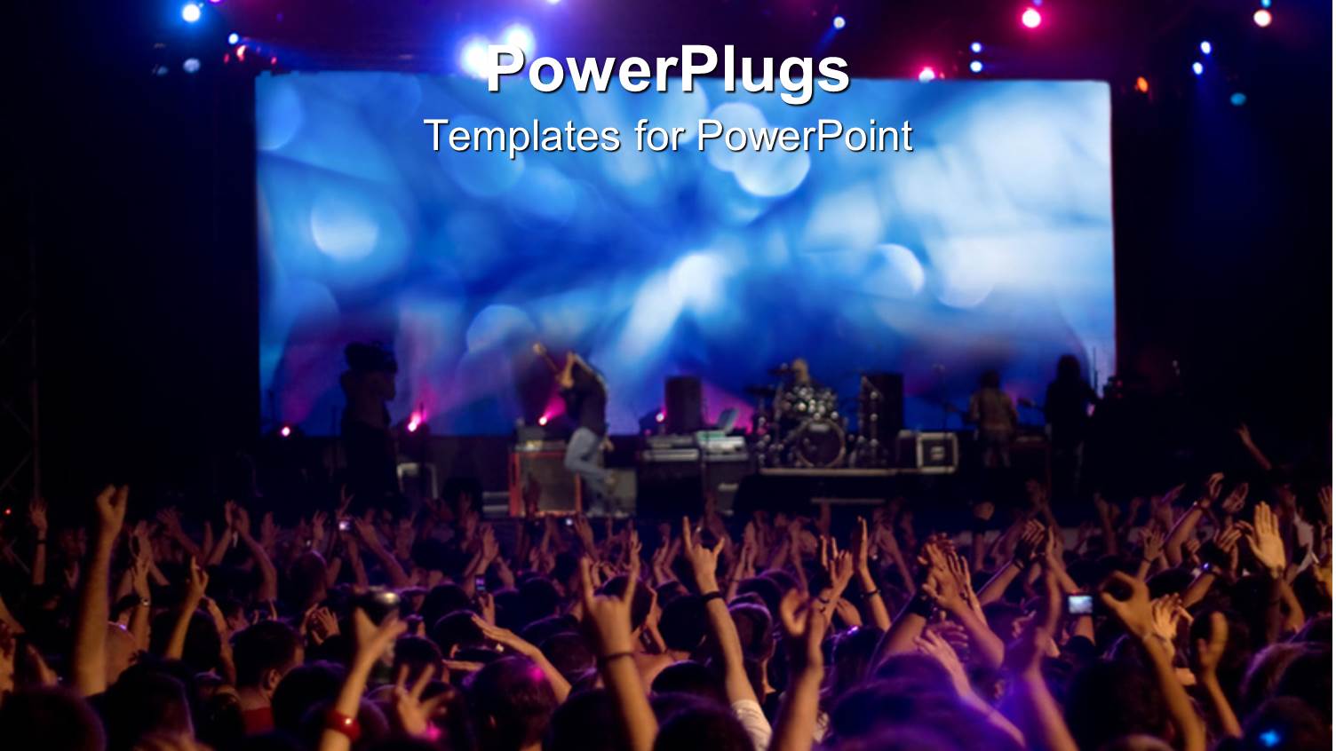 Lots of People Waving their Hands at a Musical Concert