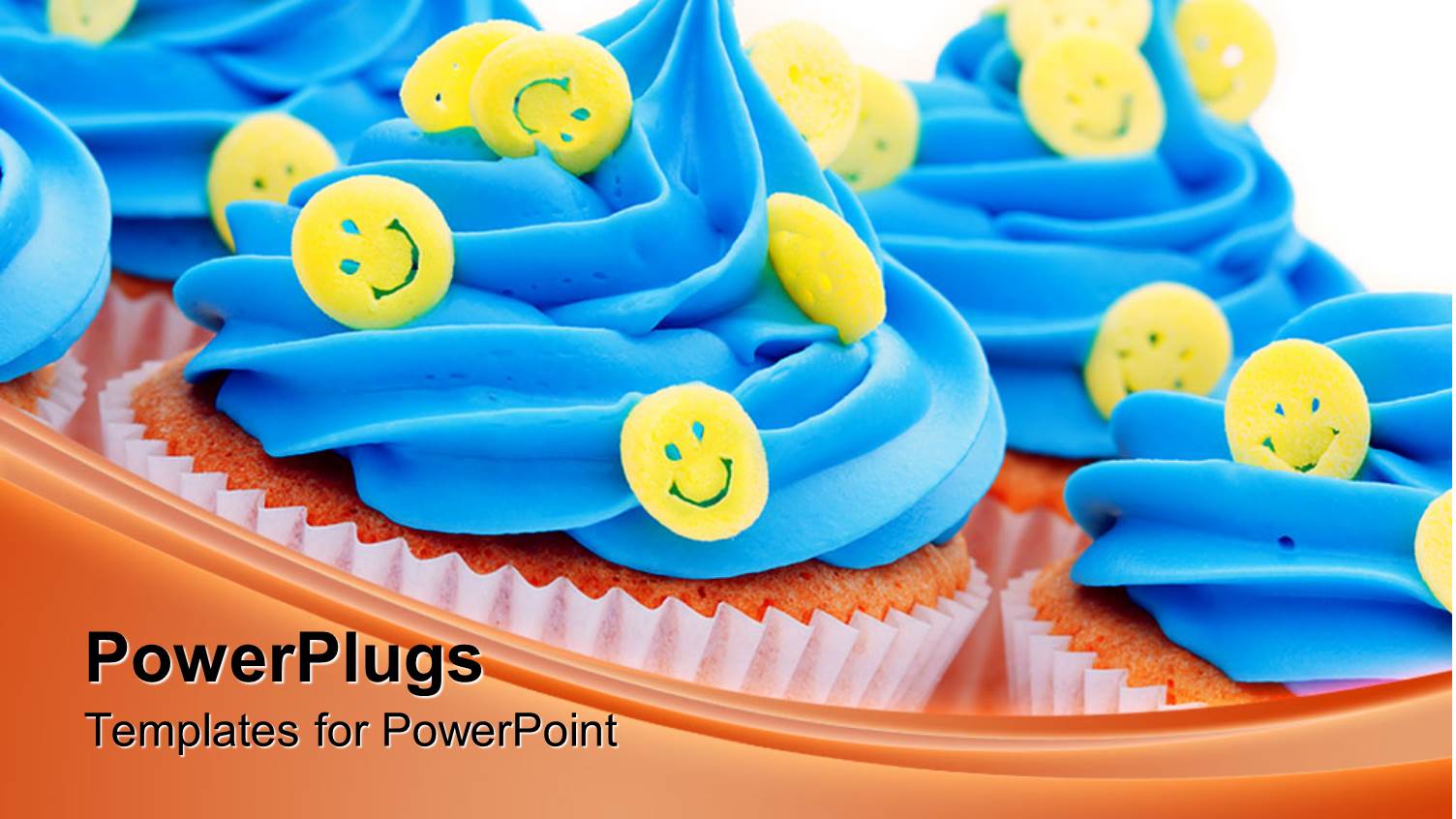 Lots of Queen Cup Cakes with Blue Icing and Yellow Smiley Faces