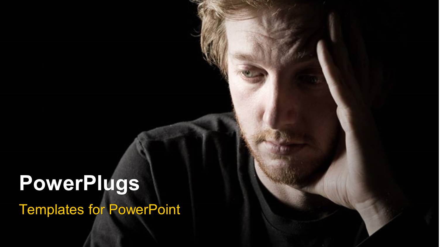 Low Key Shot of a Depressed Red Headed Male with Black Color