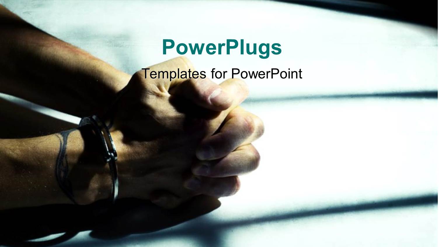 Male Cuffed Hands Over Dirty White Table Lit Through the Cell Bars with Harsh Light