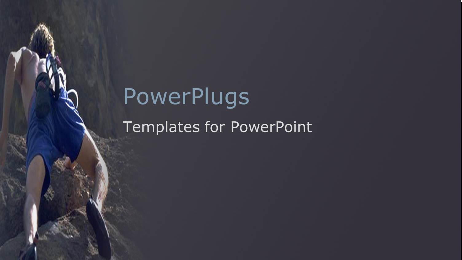 a Man in Blue Shorts Climbing a Rocky Mountain