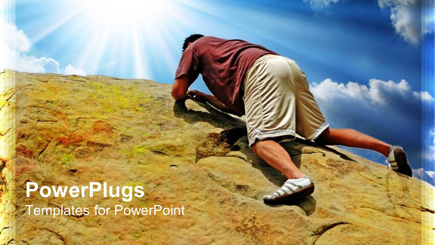 Man in Shorts Holds on to Rock while Climbing to Top