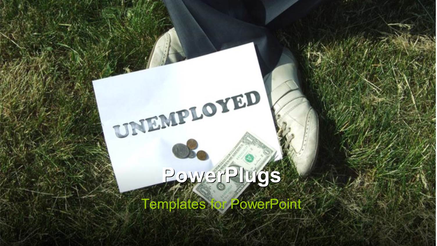 Man Sitting in Grass Field with Tag UNEMPLOYED Begs for Arms