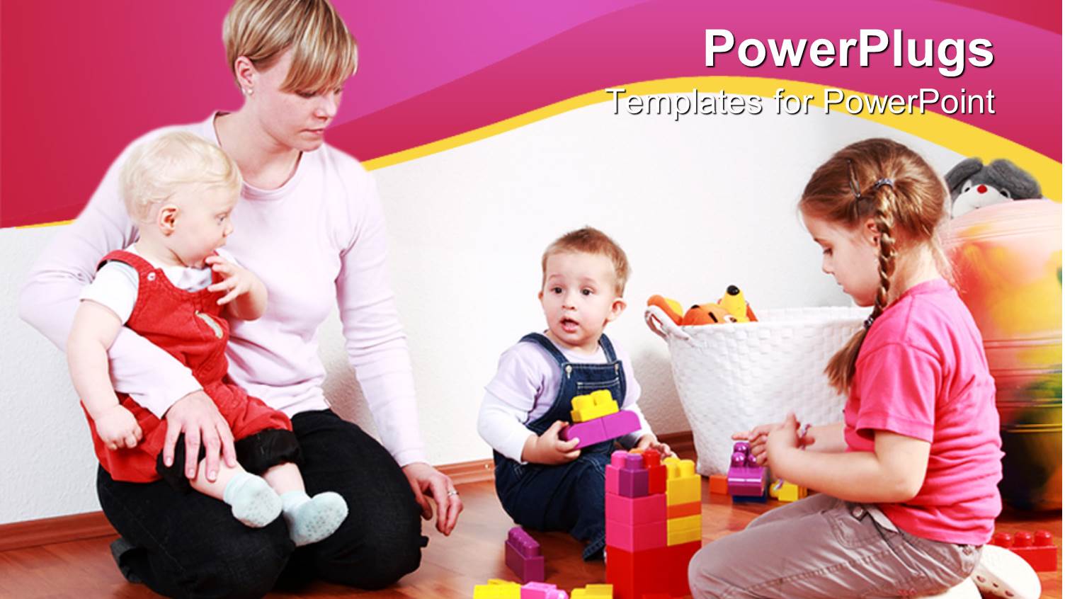 Mother with Three small Children Playing Legos