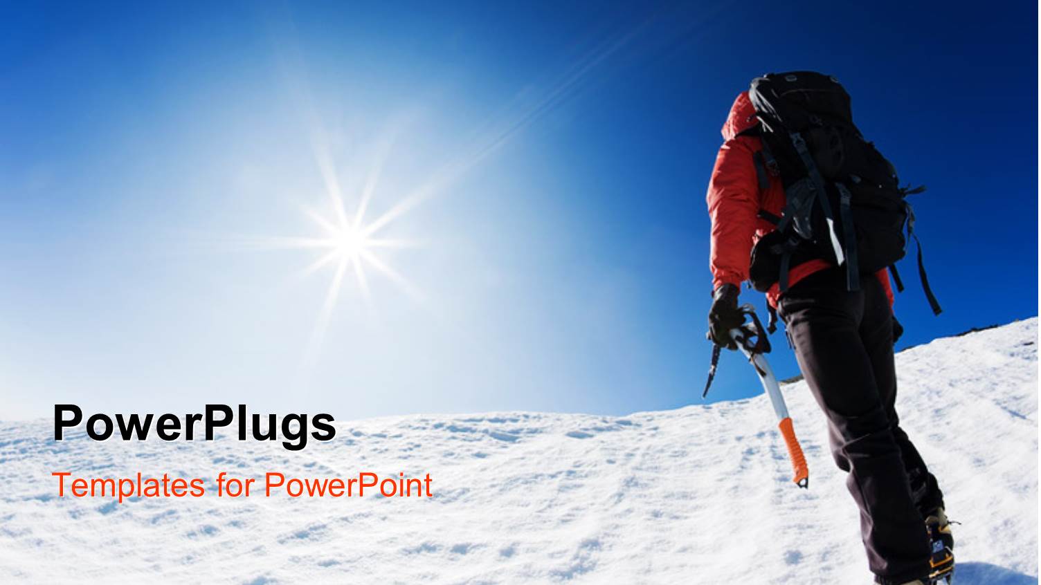 Mountaineer Reaching the Top of a Snowcapped Mountain Peak