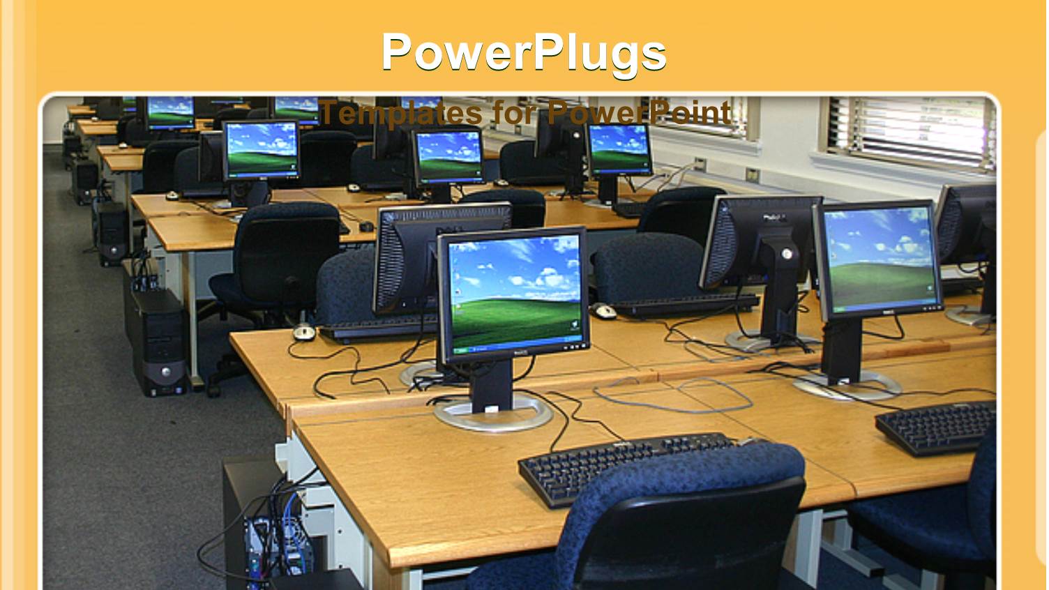 Office with Desks, Chairs and Desktop Computers Turned on