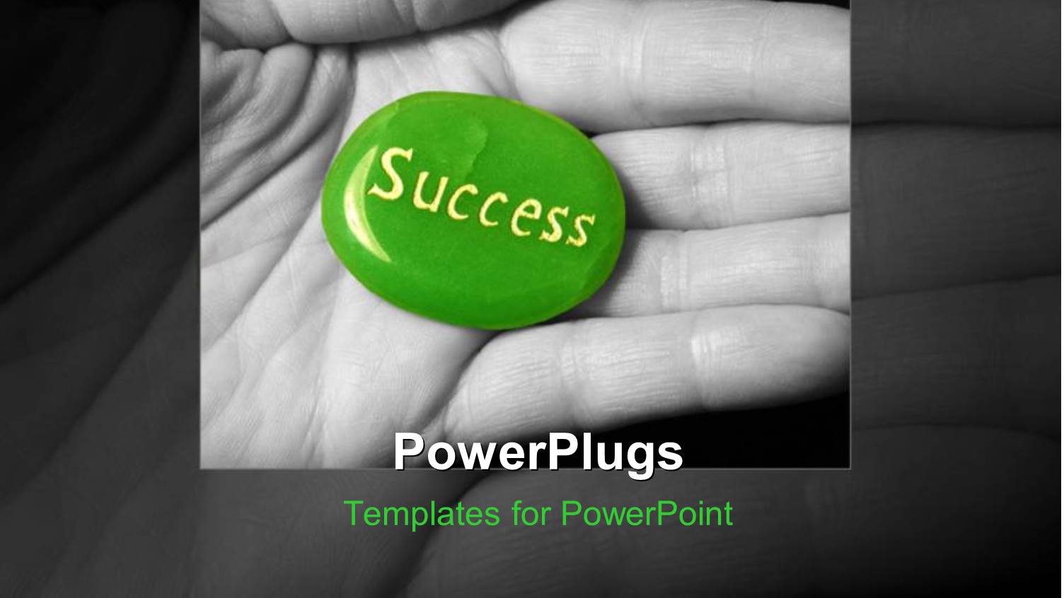 an Open Palm with a Green Pebble that has a Text Spelling Out the Word 