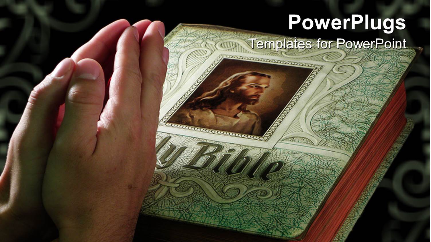 Pair of Adult Hands Clasped Together Praying on a Bible