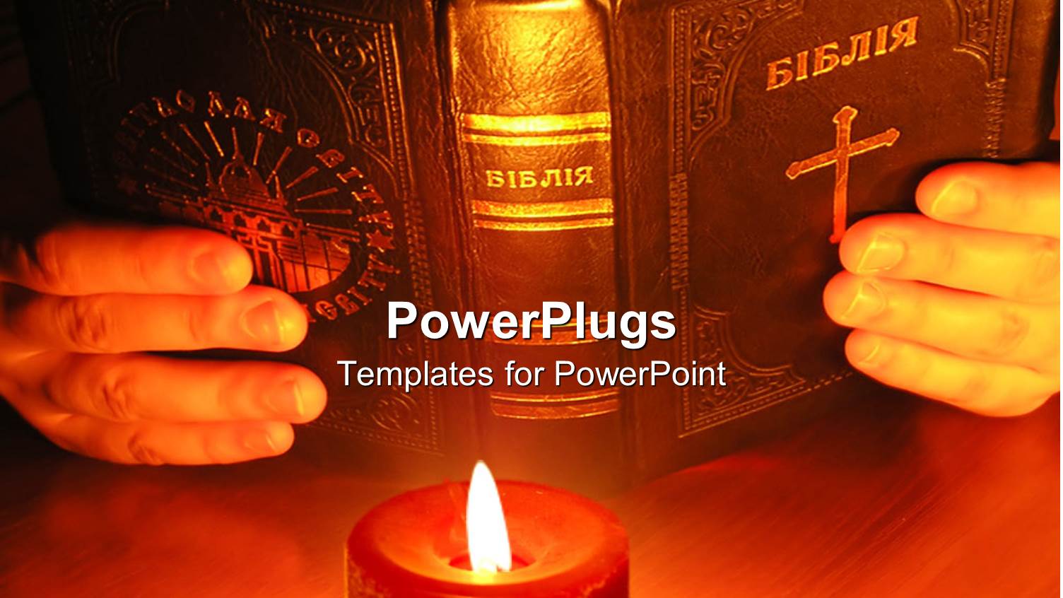 Pair Hands Holding Old Bible in Front of Burning Red Candle