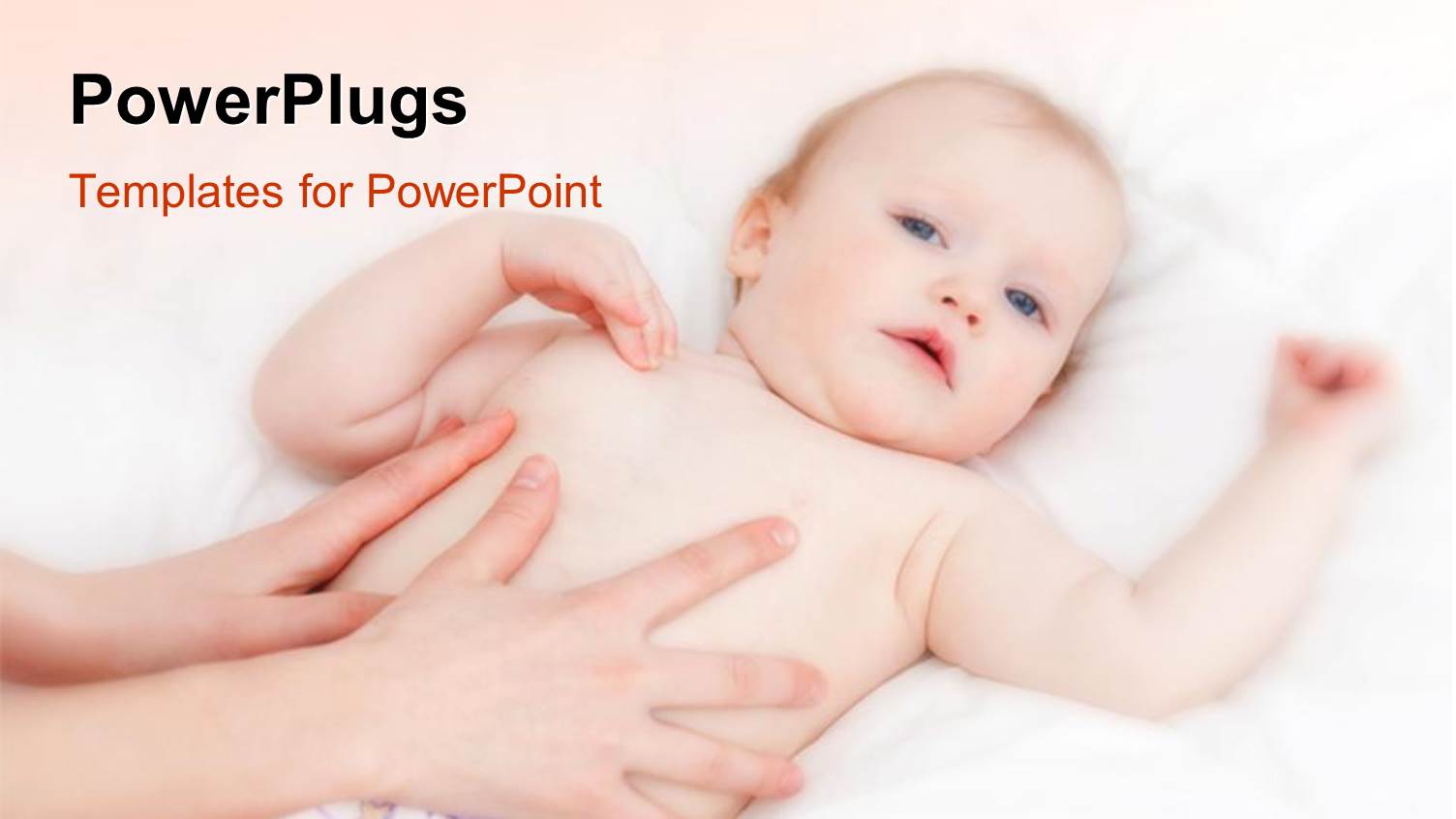 a Pair of Mothers Hands Massaging a small Baby