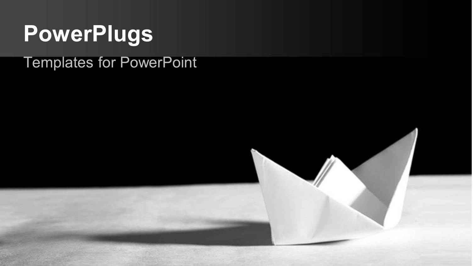 a Paper Made Boat on a White Surface and Black Background